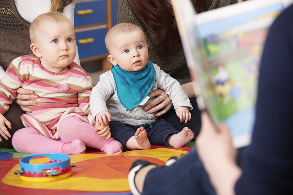 image of Baby reading book